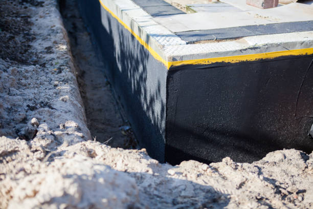 Professional Waterproofing technician working in Springfield, GA